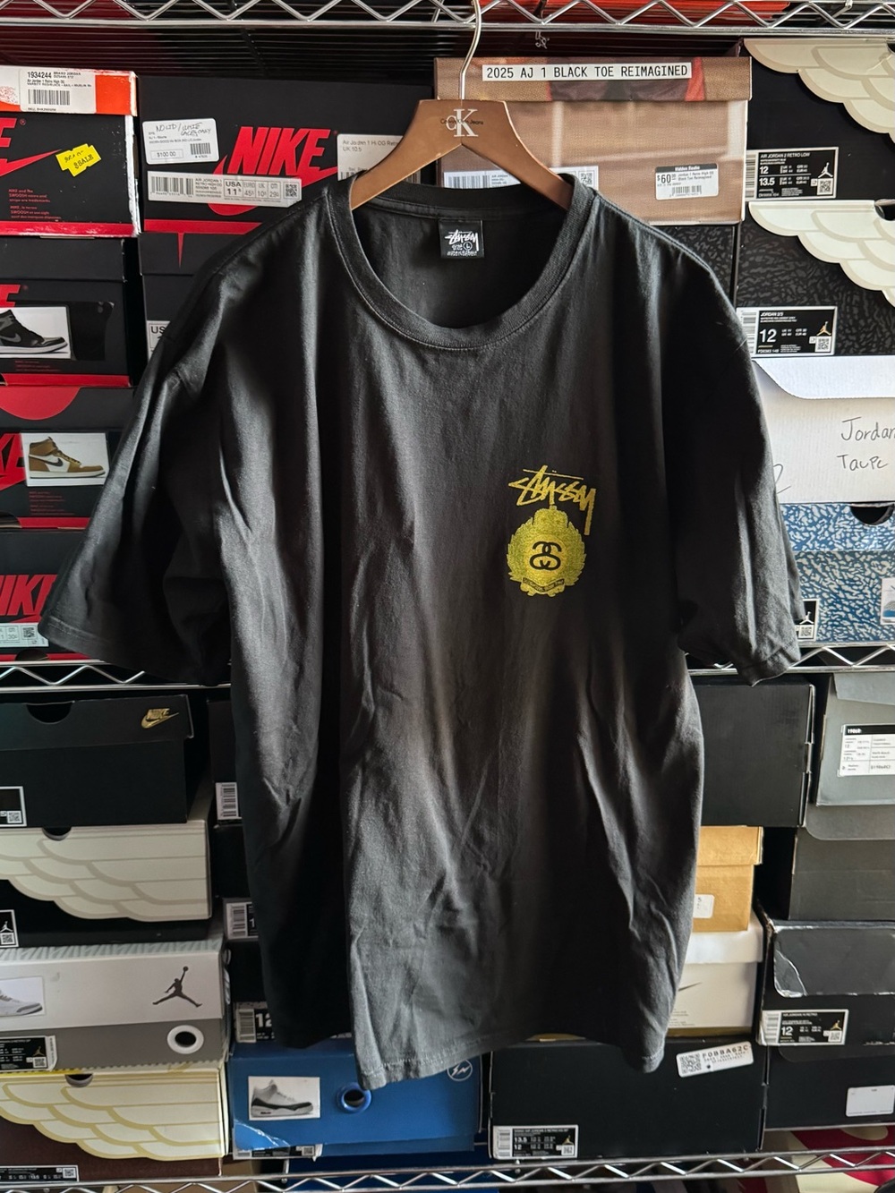 Stussy Black Short Sleeve Tee with Yellow Chest Logo